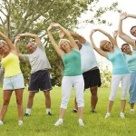 group doing stretches to warm up and cool down